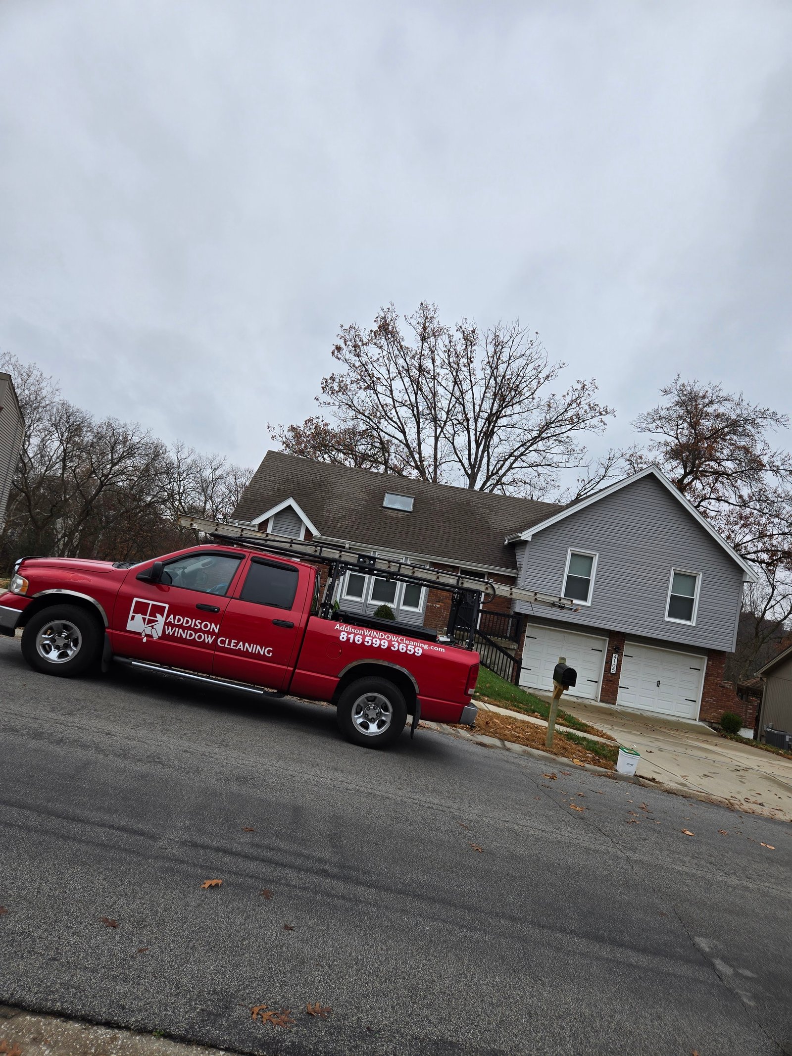 Addison Window Cleaning red pickup truck